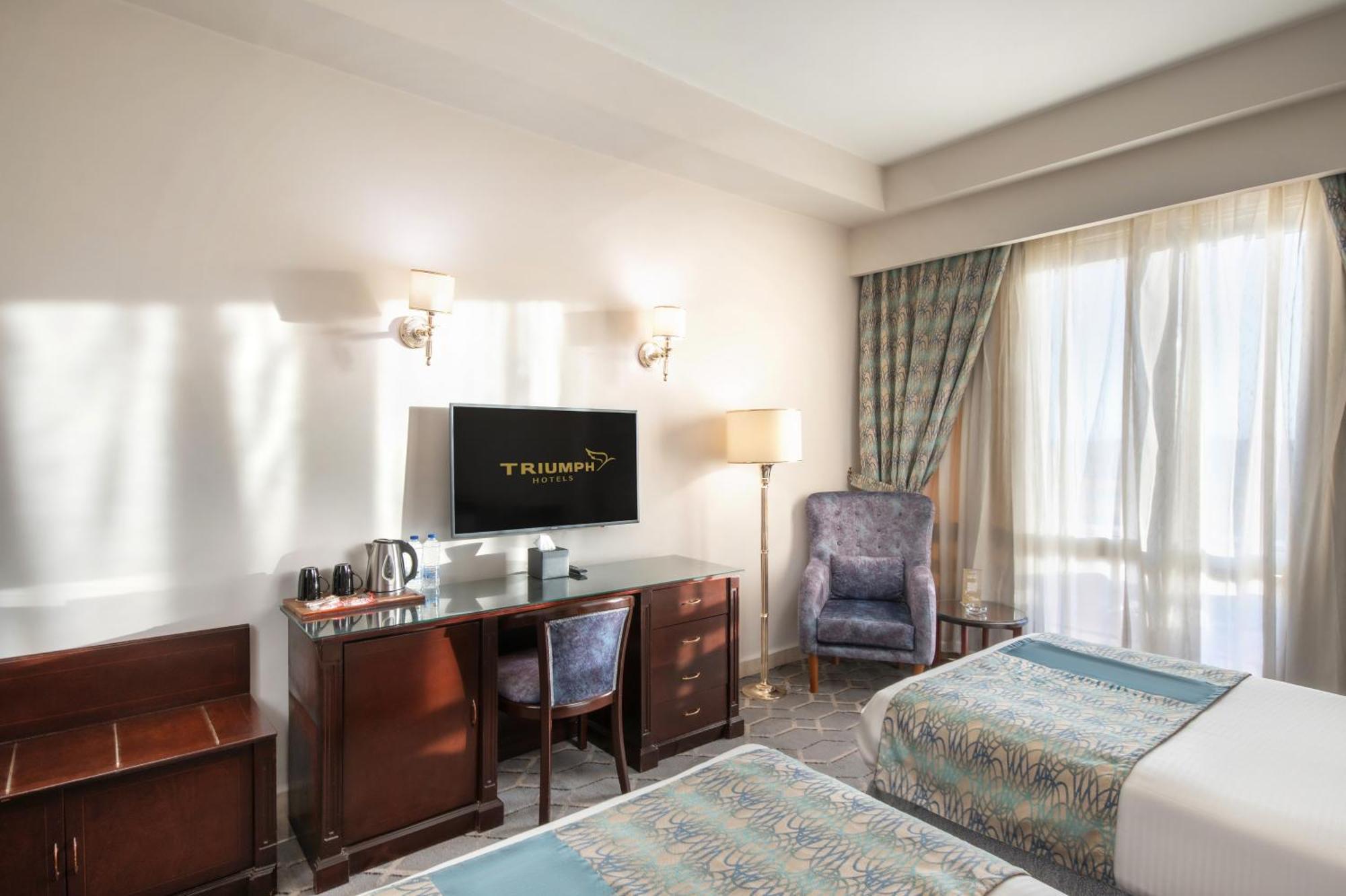 Triumph Plaza Hotel Kairo Ruang foto